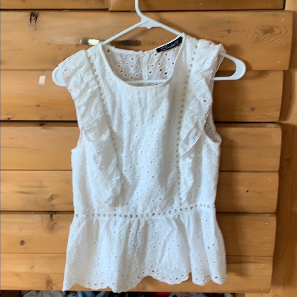 White eyelet top with opening in back